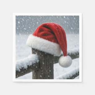 Serviette En Papier Chapeau de Père Noël sur une poteau de clôture enn