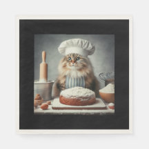 Chat duveteux faisant un gâteau