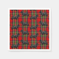 Chien écossais sur Tartan écossais rouge