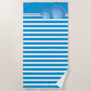 Serviettes de plage et coquilles