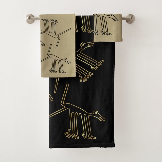 Serviettes d'or et de noir avec des lignes de Nazc (En situation)