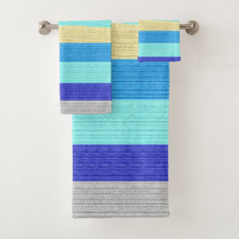 Sets mit blau und goldgestreiftem Badehandtuch