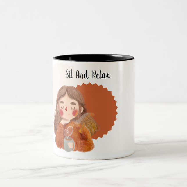 Setzen und entspannen Sie sich bei der Tasse des K (Mittel)