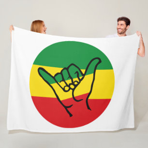 Shaka Hand mit Reggae-Farben Fleecedecke