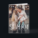 Shalom White Lettering Overlay Happy Hanukkah Feiertagskarte<br><div class="desc">Happy Hanukka! Senden Sie mit dieser Foto-Urlaubskarte mit dem Overlay "Shalom" Urlaubswünsche und Grüße an Familie und Freunde. Personalisieren Sie diese durch Hinzufügen von Namen,  Nachrichten und Fotos. Dieses Design ist als flache Karte,  gefaltete Karte und Postkarte erhältlich.</div>