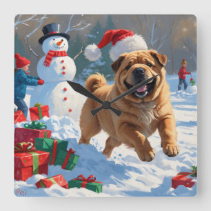 Shar Pei läuft im Schnee mit Weihnachtsmütze Quadratische Wanduhr