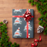 Shark Santa Claus Blue Christmas Holiday Geschenkpapier<br><div class="desc">Dieses niedliche Weihnachtsgeschenk mit marineblau-blauem Hintergrund mit Haimustern mit Weihnachtsmannmütze und Weihnachtsbeleuchtung. Ändern Sie die Hintergrundfarben und personalisieren Sie sie für Ihre Bedürfnisse. In meinem Geschäft finden Sie passende Produkte.</div>