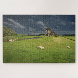 Sheep with windmills under dark clouds