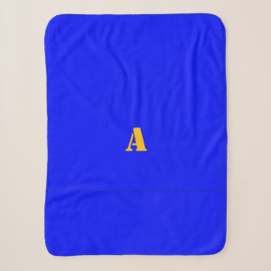 Sherpa Une couverture en polaire bleu monogramme