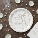 She's Tying the Knot Pearl Bow Bridal Shower Pappteller<br><div class="desc">This “She’s Tying the Knot” pearl bow bridal shower party theme showcases a soft, elegant aesthetic perfect for a chic and romantic celebration. Featuring a delicate pearl bow and graceful typography, the design blends modern minimalism with feminine charm, making it ideal for stylish pre-wedding gatherings. It pairs beautifully with coordinated...</div>