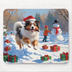 Shetland Sheepdog läuft Schnee mit Weihnachtshut Mousepad