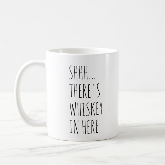 Shhh… Es gibt Whisky herein hier Kaffeetasse (Links)