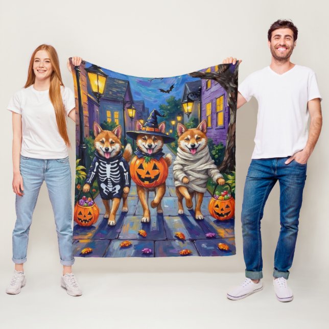 Shiba Inu Dogs in Halloween Costumes Fleecedecke (Beispiel)