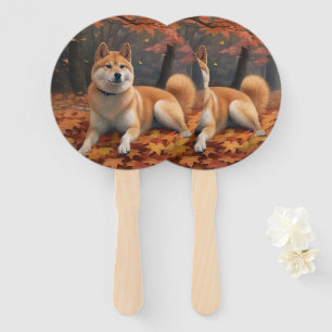 Shiba Inu im Herbst inspiriert durch fallende Blät Fächer