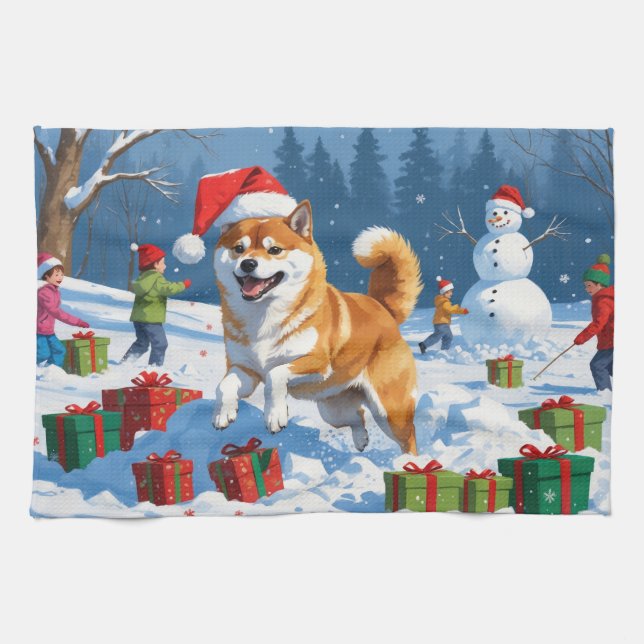 Shiba Inu läuft im Schnee mit Weihnachtsmütze Geschirrtuch (Horizontal)