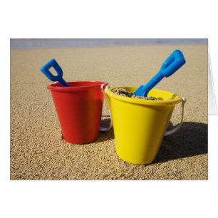 Shows und Pails am Sandstrand