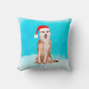Siberischer Husky-Hund im Schnee mit Weihnachtshut Kissen