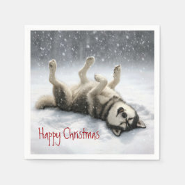 Sibirischer Husky schafft einen Schneengel Serviette