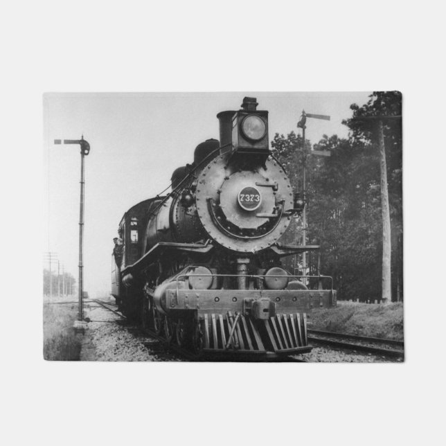 Sich fortbewegende Vintager Eisenbahn-Zug des Fußmatte (Vorderseite)