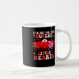 Sich um die süßesten kleinen Herzen kümmern Nicu K Kaffeetasse