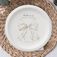 Sie bindet den weißen Bow des Knotens