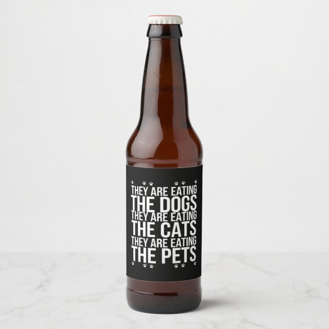 Sie essen die Hunde, die Katzen die Haustiere Trum Bierflaschenetikett (Vorderseite)