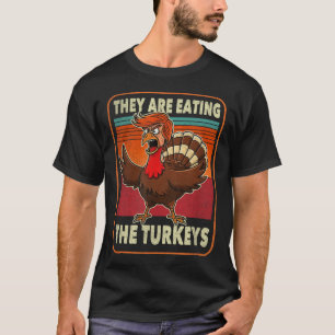 Sie essen die Truthühner, die Trump die Hand geben T-Shirt
