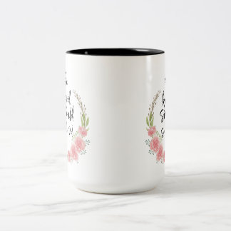Sie glaubte, dass sie einen Blumenzettel machen kö Zweifarbige Tasse
