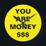 Sie sind Geld Inspiration Runde Wanduhr<br><div class="desc">Sie sind Geld Inspiration rund Uhr von Nisha Prabhu entworfen. Golden gelber Hintergrund mit schwarzem fett Text ''YOU ARE MONEY'' mit Dollarzeichen. Du bist Geld, es bedeutet, du bist wertvoll, wichtig, reich, du hast etwas, das größer ist als Geld. Perfekt inspirierende motivierend Geschenke Ideen für jeden Anlass. Was immer Sie...</div>