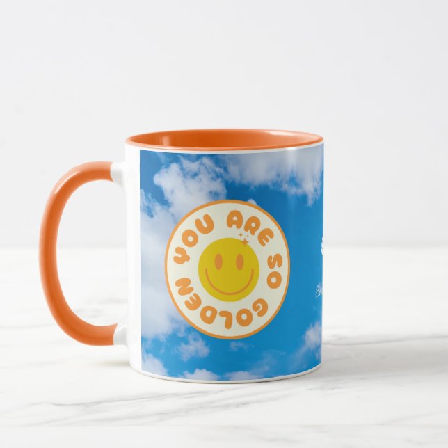 Sie sind so goldene Tasse mit orangefarbenem Griff (Links)