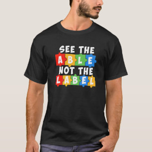 Sieh die Fähigkeit, nicht das Etikett Rätsel Autis T-Shirt