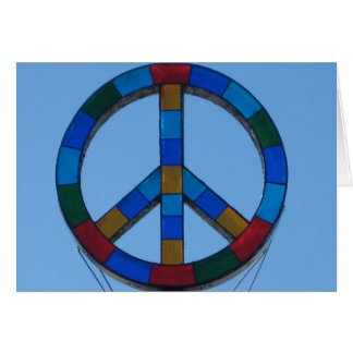 Signe de paix de plage d'océan