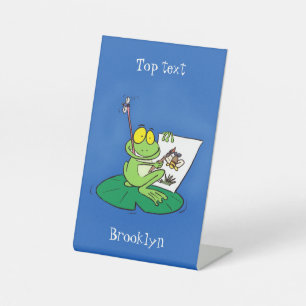 Signe De Table Caricature amusante de grenouille verte