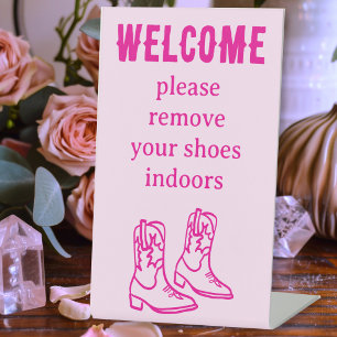 Signe De Table Enlever les chaussures Bottes de cowboy Location d