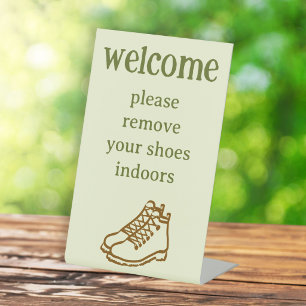 Signe De Table Enlever les chaussures Bottes de randonnée Locatio