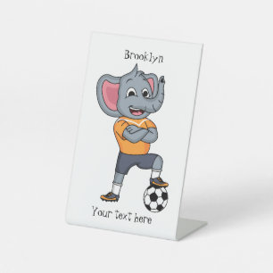 Signe De Table Illustration du joueur de football éléphant