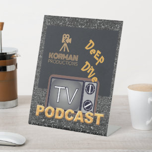 Signe De Table Korman Productions Deep Dive TV Podcast