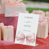 Nœud rose cartes blanches cadeaux enseigne