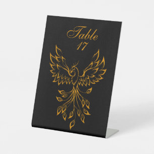 Signe De Table Phoenix de cuivre se lève sur noir