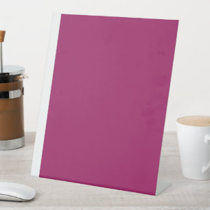Signe De Table un arrière - plan rose avec une bordure blanche