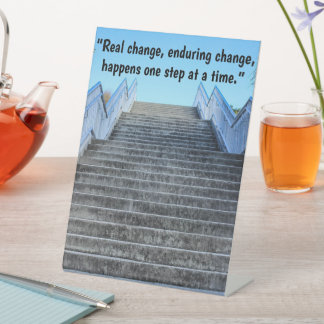 Signe 'Un pas à la fois'