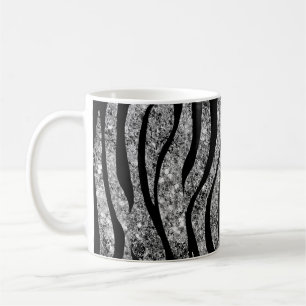 Silberner Glitzer und schwarze Kaffeetasse
