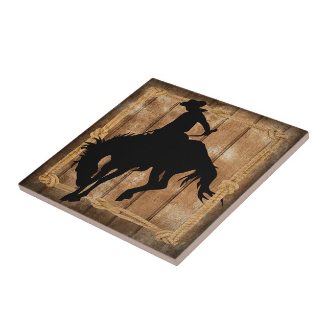 Silhouette Cowboy auf einem Bucking Bronco Pferd Fliese (Seite)