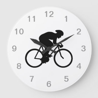 Silhouette der Radfahrer. Große Wanduhr