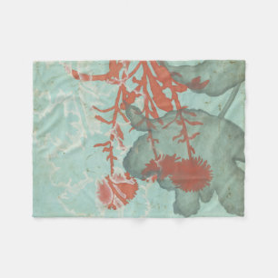 Silhouette der roten Blumen auf aquamarinem Fleecedecke