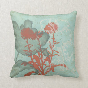 Silhouette der roten Blumen auf aquamarinem Kissen