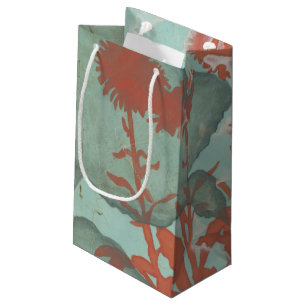 Silhouette der roten Blumen auf aquamarinem Kleine Geschenktüte