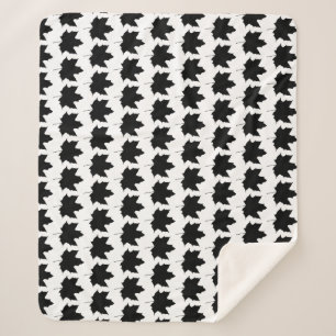 Silhouette eines Ahornblattes Sherpadecke