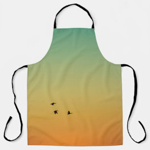 Silhouette VON VÖGELN WÄHREND DES SONNENS Schürze
