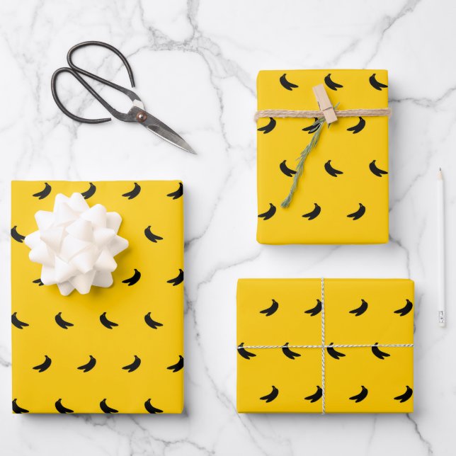 Silhouetten kleiner schwarzer Bananen auf Gelb Geschenkpapier Set (Vorderseite)